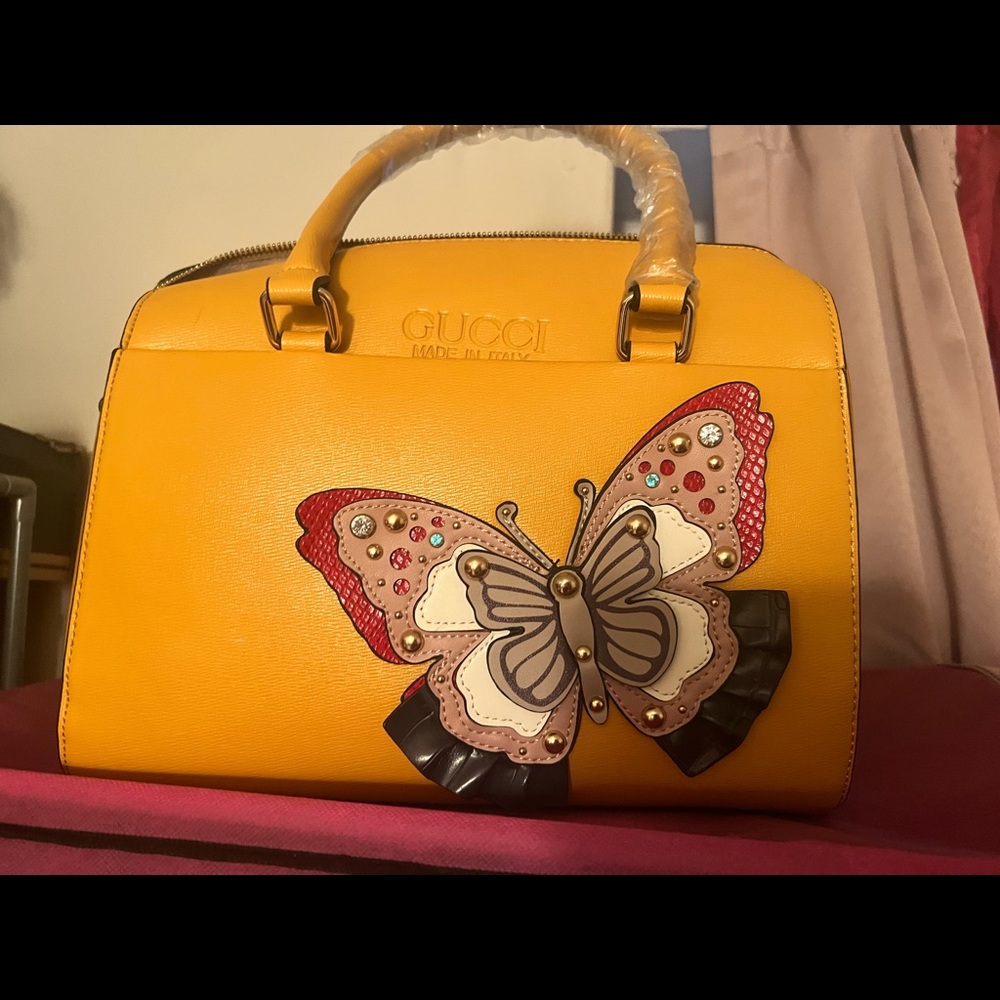 Large Mustard leather butterfly purse brand new.